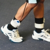 Medilogic Insoles – bezprzewodowy system do analizy chodu z czujnikami na kostkach.