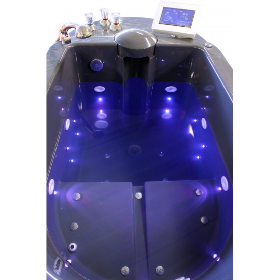 Kolumb – wanna do masażu wirowego, widok wnętrza z podświetleniem LED w kolorze niebieskim.